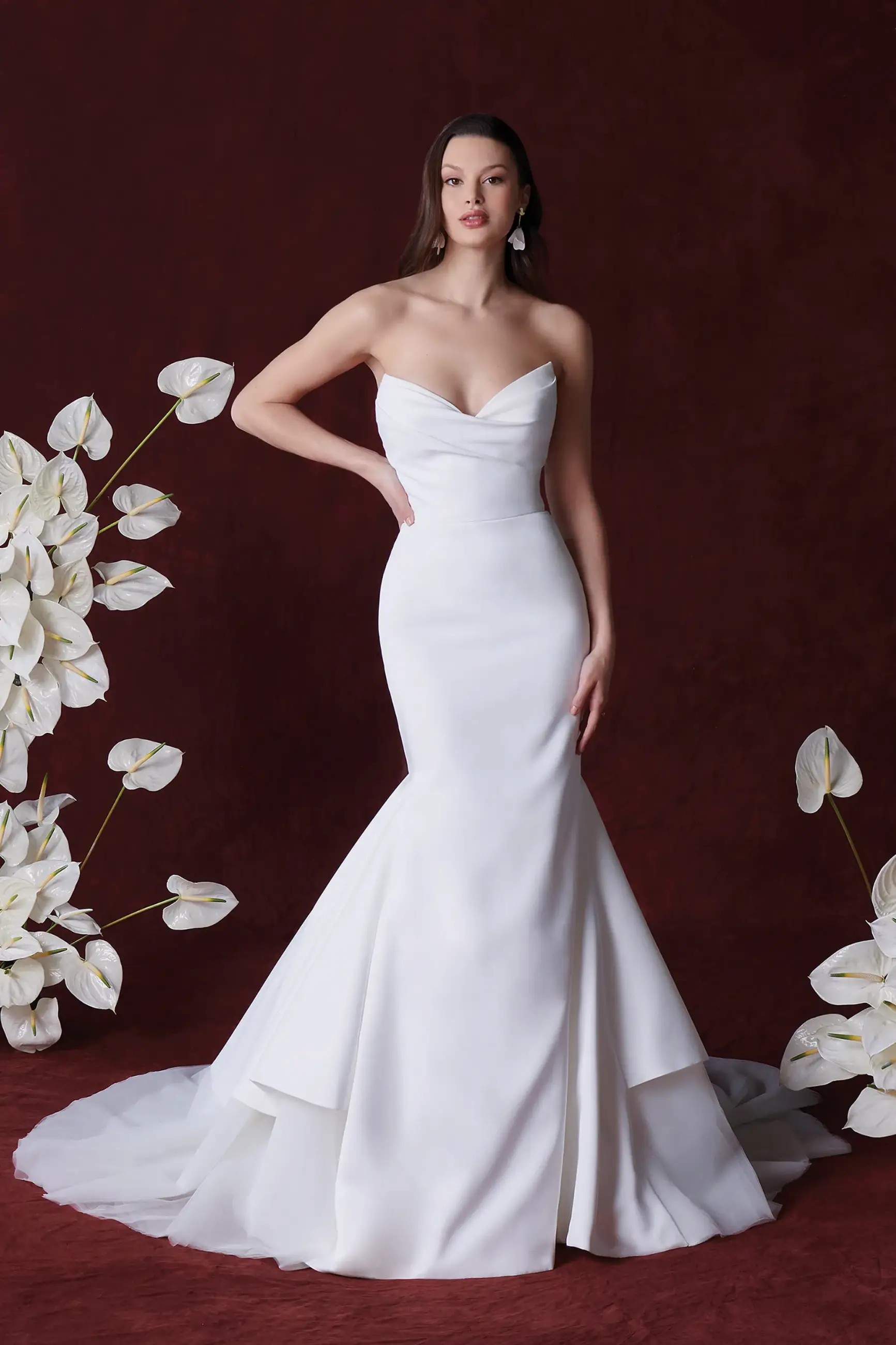 Model wearing a gown by Justin Alexander